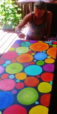 Nadia painting a table while in Key West this April