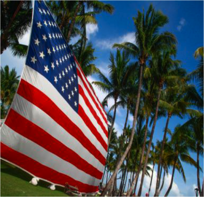 Old Glory waving on the beachfront